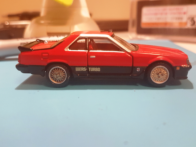 Half done. I wish I took a photo when it was still slathered in paint. Was still experimenting with just shadows on the bolt area at the time.